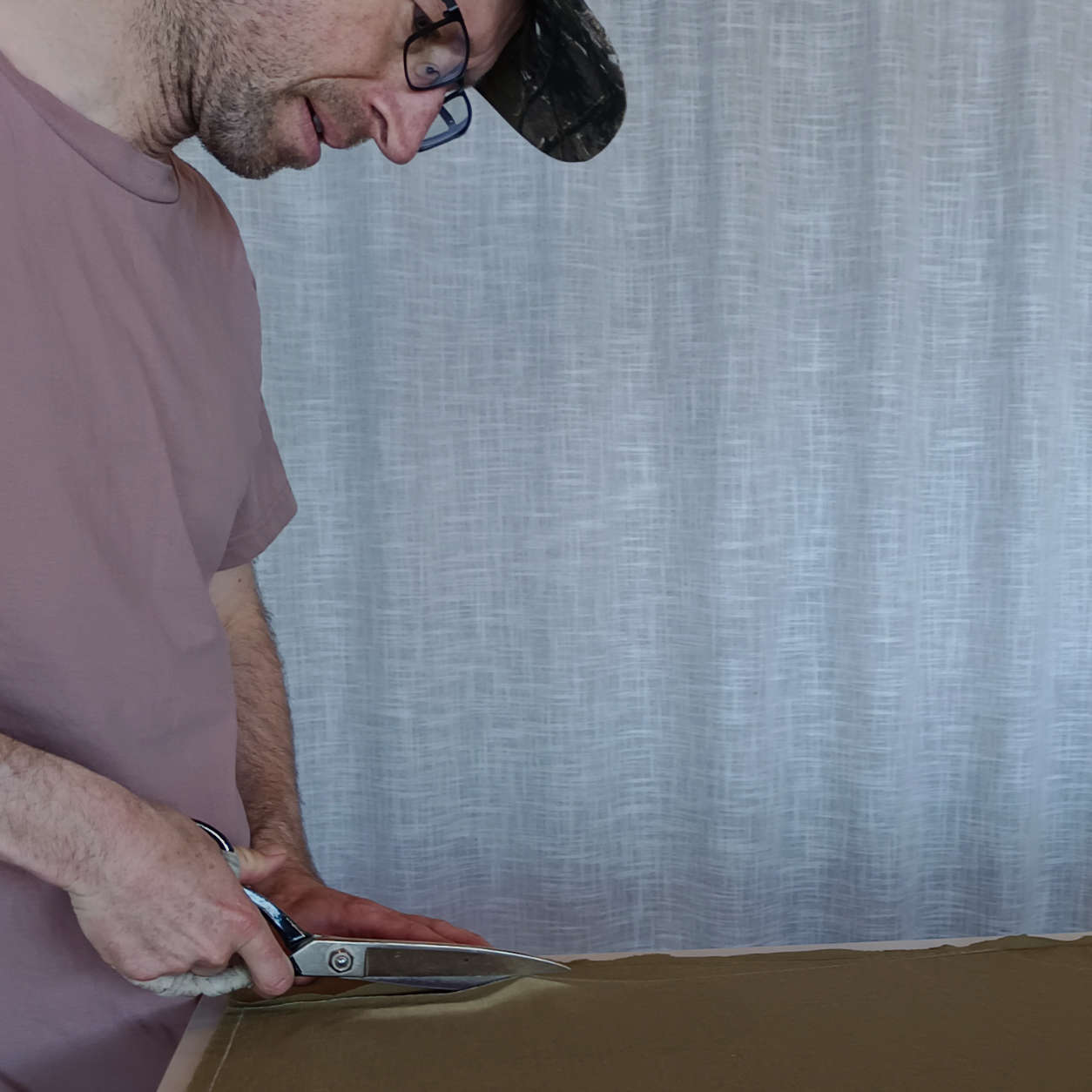 Cutting fabric for a Wild Balance hoodie.